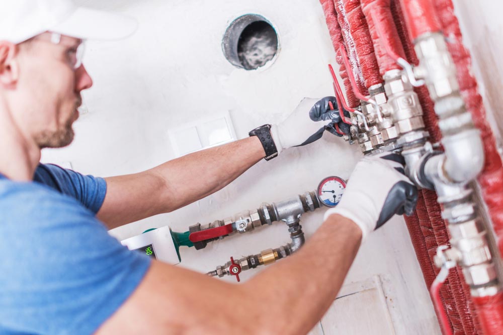 plumber checking water valves Sarasota, MN